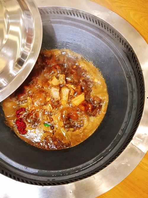 莱芜铁锅炖吃瓜,传统美食中的夏日清凉体验